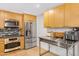 Spacious kitchen features stainless steel appliances and ample counter space at 7131 E Rancho Vista Dr # 1008, Scottsdale, AZ 85251