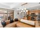 Bright living room boasts a modern kitchen and stylish decor overlooking the serene patio at 7131 E Rancho Vista Dr # 1008, Scottsdale, AZ 85251