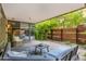 Stylish outdoor patio with comfortable seating and lush landscaping at 7131 E Rancho Vista Dr # 1008, Scottsdale, AZ 85251