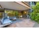 Relaxing outdoor patio space with modern furnishings and a tranquil setting at 7131 E Rancho Vista Dr # 1008, Scottsdale, AZ 85251