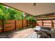 Cozy patio featuring modern furnishings, privacy fencing, and a tranquil setting for relaxing and enjoying the outdoors at 7131 E Rancho Vista Dr # 1008, Scottsdale, AZ 85251
