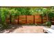 Outdoor patio with stylish lounge seating, a lush garden, and privacy fence offering a peaceful space to relax and unwind at 7131 E Rancho Vista Dr # 1008, Scottsdale, AZ 85251