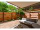 Inviting patio with comfortable seating, privacy fence, and lush greenery perfect for outdoor relaxation and entertainment at 7131 E Rancho Vista Dr # 1008, Scottsdale, AZ 85251
