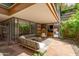 Expansive covered patio featuring modern furniture, stylish decor, and an open-air design ideal for leisure and gatherings at 7131 E Rancho Vista Dr # 1008, Scottsdale, AZ 85251