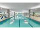 Bright, spacious indoor swimming pool featuring multiple lanes and clear water at 7131 E Rancho Vista Dr # 1008, Scottsdale, AZ 85251