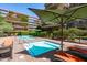 Relaxing outdoor spa and pool area with lounge chairs and building views at 7131 E Rancho Vista Dr # 1008, Scottsdale, AZ 85251