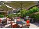 Inviting outdoor pool area with lounge seating, BBQ, and well-maintained landscaping at 7131 E Rancho Vista Dr # 1008, Scottsdale, AZ 85251