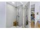 Elegant walk-in shower with floor-to-ceiling tile and a built-in bench at 7131 E Rancho Vista Dr # 1008, Scottsdale, AZ 85251