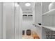 Bright walk-in closet featuring custom shelving and ample storage space at 7131 E Rancho Vista Dr # 1008, Scottsdale, AZ 85251