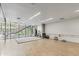 Bright workout and yoga room with large windows and hardwood floors at 7131 E Rancho Vista Dr # 1008, Scottsdale, AZ 85251