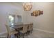 Charming dining room with natural light, a wooden table, and comfortable seating at 8337 E Shetland Trl, Scottsdale, AZ 85258