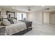 Inviting main bedroom with a gray color palette and a private entrance to the backyard at 8337 E Shetland Trl, Scottsdale, AZ 85258