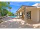 Spacious patio area with views of the sparkling pool, barbecue and ample space for dining at 8337 E Shetland Trl, Scottsdale, AZ 85258