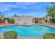 Backyard pool and lush landscaping create a private oasis, perfect for outdoor living at 8337 E Shetland Trl, Scottsdale, AZ 85258
