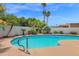 Inviting pool with mature landscaping, a tranquil oasis for relaxation and entertainment at 8337 E Shetland Trl, Scottsdale, AZ 85258