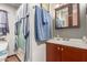 Bathroom with a single sink vanity and tub shower combo at 11596 W Sierra Dawn Blvd # 307, Surprise, AZ 85378
