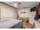 Serene bedroom with wood-look flooring and neutral paint tones for a restful and calming atmosphere at 11596 W Sierra Dawn Blvd # 307, Surprise, AZ 85378