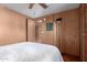 Bedroom with paneled wall and neutral decor providing a simple and serene retreat at 11596 W Sierra Dawn Blvd # 307, Surprise, AZ 85378