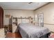 Comfortable bedroom with ceiling fan, offering a restful and inviting space to unwind and relax at 11596 W Sierra Dawn Blvd # 307, Surprise, AZ 85378