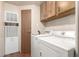 Functional laundry area with modern washer and dryer, providing convenience and efficiency at 11596 W Sierra Dawn Blvd # 307, Surprise, AZ 85378