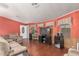 Inviting living room with cozy sofas, entertainment center, and ample space at 11596 W Sierra Dawn Blvd # 307, Surprise, AZ 85378