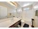 Bright bathroom featuring a vanity with ample counter space and modern fixtures at 13676 N 73Rd Dr, Peoria, AZ 85381