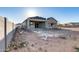 New house backyard featuring block wall, patio cover, and landscaping opportunities at 14723 N 73Rd Dr, Peoria, AZ 85381