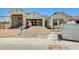 New construction home featuring a three-car garage with a durable frame at 14723 N 73Rd Dr, Peoria, AZ 85381