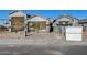 The exterior of a new construction home with scaffolding and building materials at 14723 N 73Rd Dr, Peoria, AZ 85381