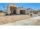New construction featuring a three-car garage, ready for customization at 14723 N 73Rd Dr, Peoria, AZ 85381