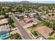 Aerial view of a single-Gathering home with a pool in a residential neighborhood with mountain views at 22616 S 194Th St, Queen Creek, AZ 85142