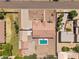 Aerial view of a single-Gathering home with a pool and a spacious driveway in a residential neighborhood at 22616 S 194Th St, Queen Creek, AZ 85142