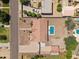 Aerial view of a single-Gathering home with a pool and spacious backyard in a well-maintained neighborhood at 22616 S 194Th St, Queen Creek, AZ 85142