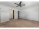 Bedroom includes a ceiling fan and access to the closet and bathroom at 2938 N 18Th Ave, Phoenix, AZ 85015