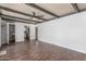 The living room features hardwood floors and flows into the kitchen area at 2938 N 18Th Ave, Phoenix, AZ 85015
