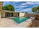 Backyard with in-ground pool and outdoor patio offers space for relaxation and entertaining at 2938 N 18Th Ave, Phoenix, AZ 85015