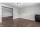 Stylish room with hard wood floors and access to other rooms at 2938 N 18Th Ave, Phoenix, AZ 85015