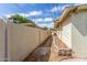 Side yard featuring a walkway lined with wood chips at 2938 N 18Th Ave, Phoenix, AZ 85015