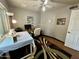 Bedroom with ceiling fan, wood-look floors and plenty of natural light at 955 W Obispo Ave, Mesa, AZ 85210