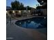 Inviting backyard pool area with decorative lighting and lush landscaping at 955 W Obispo Ave, Mesa, AZ 85210