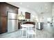 Efficient eat-in kitchen offers stainless steel appliances, a dining space, and seamless access to the backyard at 1321 E Brill St, Phoenix, AZ 85006
