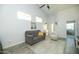 Cozy living room featuring tile floors, natural light and connects seamlessly to the entry and other living spaces at 1321 E Brill St, Phoenix, AZ 85006