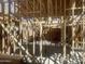 Interior framing of a home under construction, showcasing the layout and structural design at 1664 N 431St Ave, Tonopah, AZ 85354