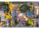 This aerial view showcases a gorgeous home, pool, large yard, and luscious landscaping at 21315 E Marsh Rd, Queen Creek, AZ 85142