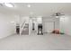 Spacious basement with carpet, stairs, and an archway in a home at 21315 E Marsh Rd, Queen Creek, AZ 85142