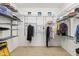 Spacious walk-in closet with ample shelving and hanging space at 21315 E Marsh Rd, Queen Creek, AZ 85142