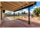 A large backyard features a brick patio, block wall, and a covered area at 3008 W Michigan Ave, Phoenix, AZ 85053