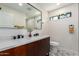 Bathroom features double sink vanity, patterned floor, and lots of light at 3008 W Michigan Ave, Phoenix, AZ 85053