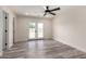 Bright, airy bedroom with double doors to the backyard and neutral color palette at 3008 W Michigan Ave, Phoenix, AZ 85053