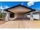 Close-up of home featuring a wide two-car covered carport at 3008 W Michigan Ave, Phoenix, AZ 85053